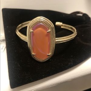Kendra Scott bracelet with coral colored stone